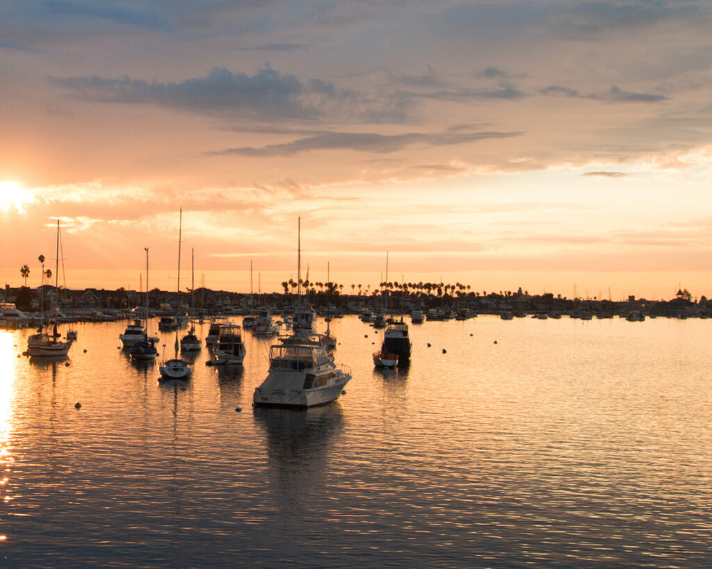 boats in the sunset; coherence therapy in San Diego